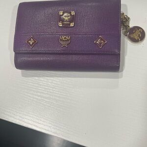 MCM Purple Leather Trifold Wallet with Gold Accents and Charm